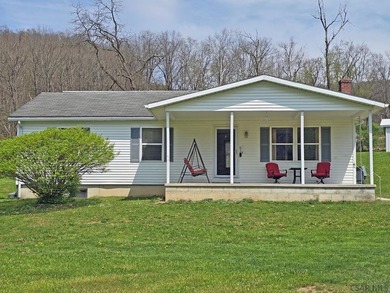 Tucked into the heart of an outdoor paradise, this 3 bedroom, 1 - photo 2