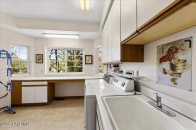 Set in the serene community of Timber Ridge this stunning 5