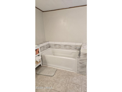 Less than one minute from the boat landing!! Three bedroom, two - photo 22