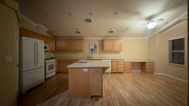 Set on an attractive corner lot, this beautifully maintained - photo 3