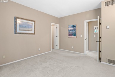 Perched on the top floor of a well-maintained building, this