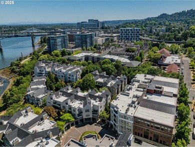 Perched on the top floor of a well-maintained building, this