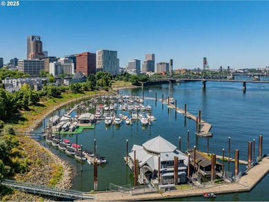 Perched on the top floor of a well-maintained building, this