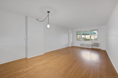 Discover this charming first-floor apartment located in the