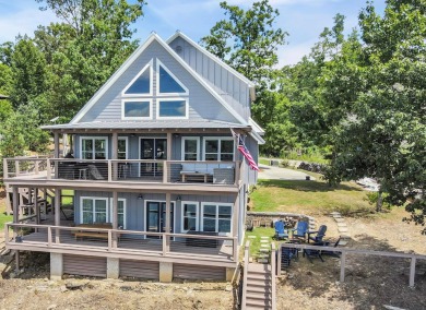Smith Lake (Ryan Creek) An immaculate 5BR cottage overlooking - Lake Home For Sale in Bremen, Alabama