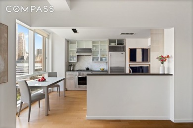 Perched on the 21st floor of the highly sought-after 200 - photo 2