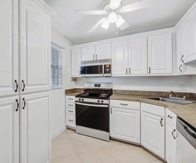 Welcome to this newly renovated, move-in-ready first-floor condo - photo 1