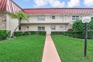 Welcome to this newly renovated, move-in-ready first-floor condo - photo 2