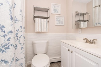 LOOK NO FURTHER!! THIS BEAUTIFULLY RENOVATED END-UNIT CONDO IS - photo 14