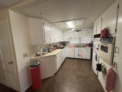 SPACIOUS HOME, VERY WELL MAINTAINED WITH 2 BEDROOMS, 2 BATHS AND - photo 15
