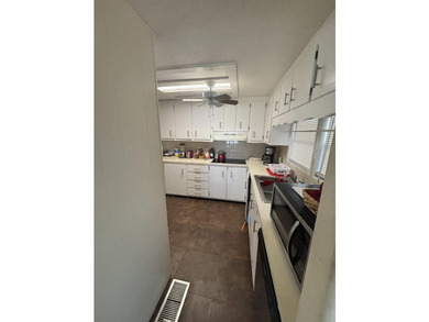 SPACIOUS HOME, VERY WELL MAINTAINED WITH 2 BEDROOMS, 2 BATHS AND - photo 19