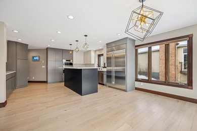 Stunning Crosswinds neighborhood home overlooking a serene pond - photo 13