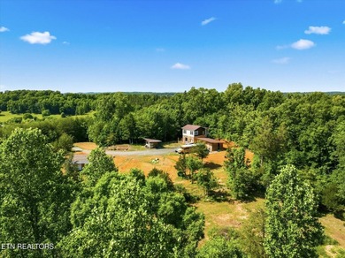 Tucked away in the beauty of East Tennessee, this unfinished - photo 3