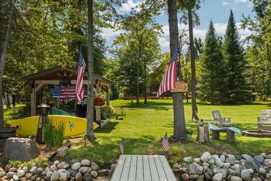 Experience exceptional lakefront living with 100 feet of - photo 4
