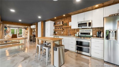 Experience luxury lakefront living on a scale rarely found at - photo 26