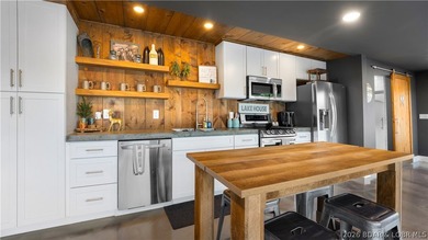 Experience luxury lakefront living on a scale rarely found at - photo 27