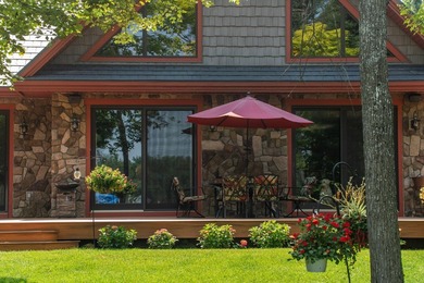 Experience exceptional lakefront living with 100 feet of - photo 9