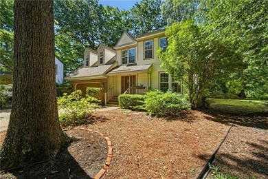 Welcome to this well loved and maintained pond front home in - photo 3
