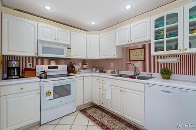 This esquite Condo is overlooking the sparkling Lake and the - photo 12