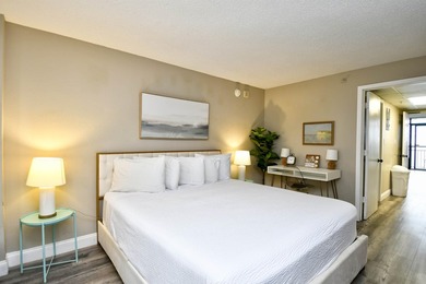 Wake up to breathtaking oceanfront views in this beautifully - photo 11