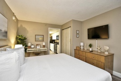 Wake up to breathtaking oceanfront views in this beautifully - photo 12