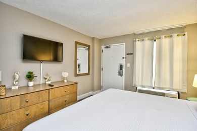 Wake up to breathtaking oceanfront views in this beautifully - photo 13