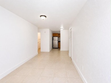 Welcome to this efficient 1-bedroom, 1-bathroom corner unit at - photo 4