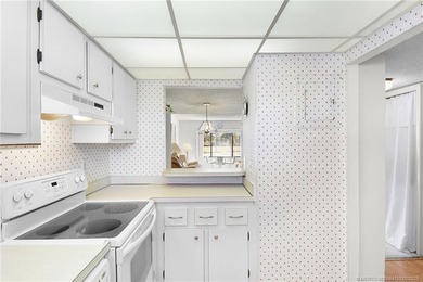 Second Floor 1/1.5 Condo with golf course views in Miles Grant - photo 11