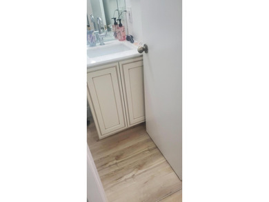 Nicely renovated 1st floor 1 Bedroom, 1.5 Baths condo located in - photo 11