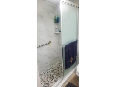 Nicely renovated 1st floor 1 Bedroom, 1.5 Baths condo located in - photo 13