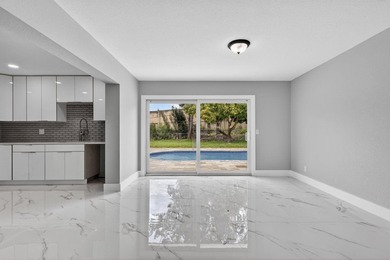 Welcome to this charming single-story residence located in Lake - photo 10