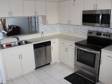 Welcome to this thoughtfully designed three-bedroom - photo 6