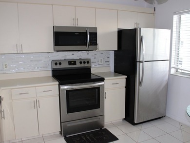 Welcome to this thoughtfully designed three-bedroom - photo 7