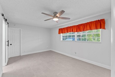 Spacious 4 bedroom, 2 bathroom home, with garage and a versatile - photo 17