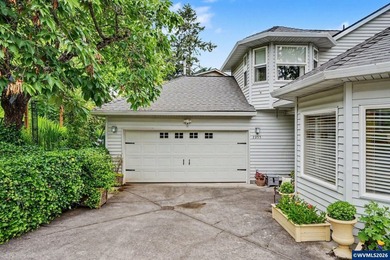 !IMPROVED PRICE! Nestled among the trees, this beautifully - photo 2