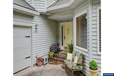 !IMPROVED PRICE! Nestled among the trees, this beautifully - photo 3