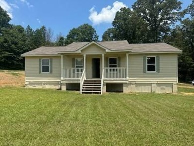 Lake Home For Sale in Gore Springs, Mississippi