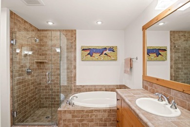 One level. open, light-filled living with upgraded kitchen