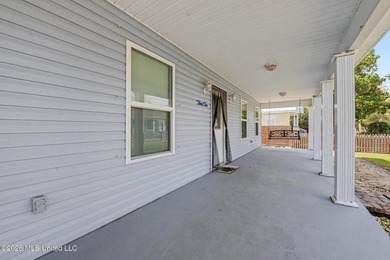 Welcome to coastal living in the heart of Bay St. Louis, located - photo 4