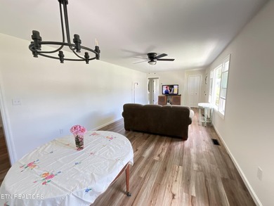 Modern City Living Near the Lake! 3 BR | 2 BA | Fully Updated - photo 7