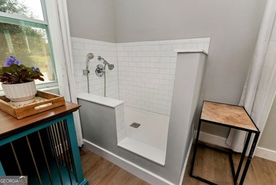 SELLER WILL OFFER $10,000 TOWARDS RATE BUYDOWN OR CLOSING COST - photo 41