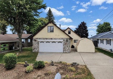 Enjoy the best of waterfront living in this charming 4-bedroom - photo 1