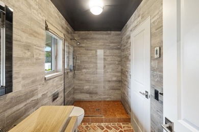 Uniquely reimagined and extensively upgraded, this exceptional - photo 26