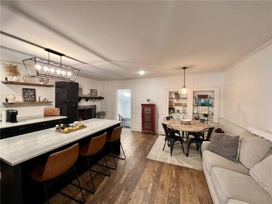 This charming bungalow home evokes the charm of the past with - photo 4