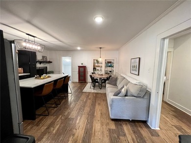This charming bungalow home evokes the charm of the past with - photo 7