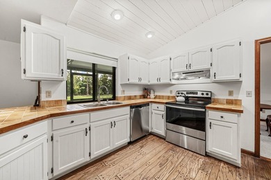 Discover the charm and character of this custom-built cedar home - photo 3