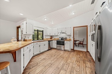 Discover the charm and character of this custom-built cedar home - photo 6