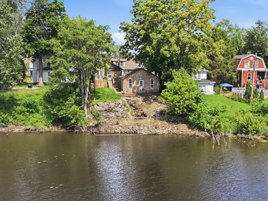 Lakefront Retreat on Lake George - Full of Charm & Opportunity! - photo 1