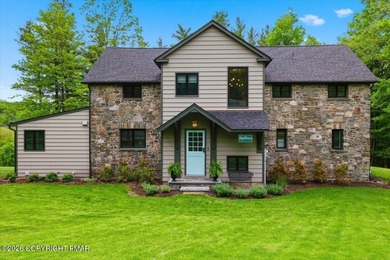 This elegant home is beautifully nestled on 1.5 acres high on - photo 1