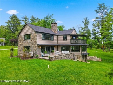 This elegant home is beautifully nestled on 1.5 acres high on - photo 4